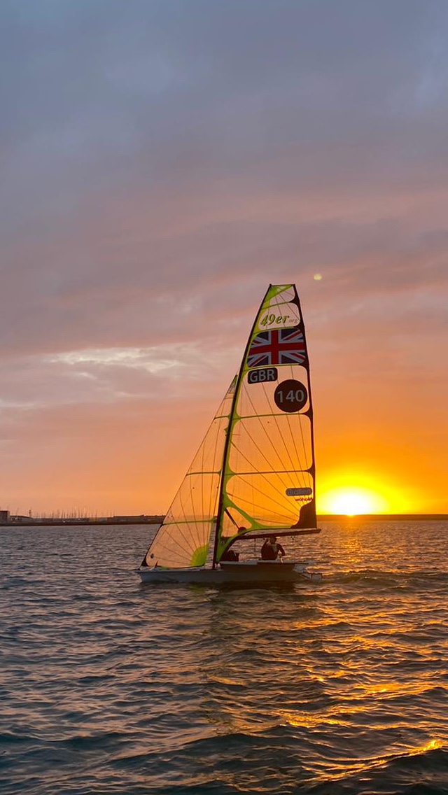 Ewan Gribbin sailing at sunset