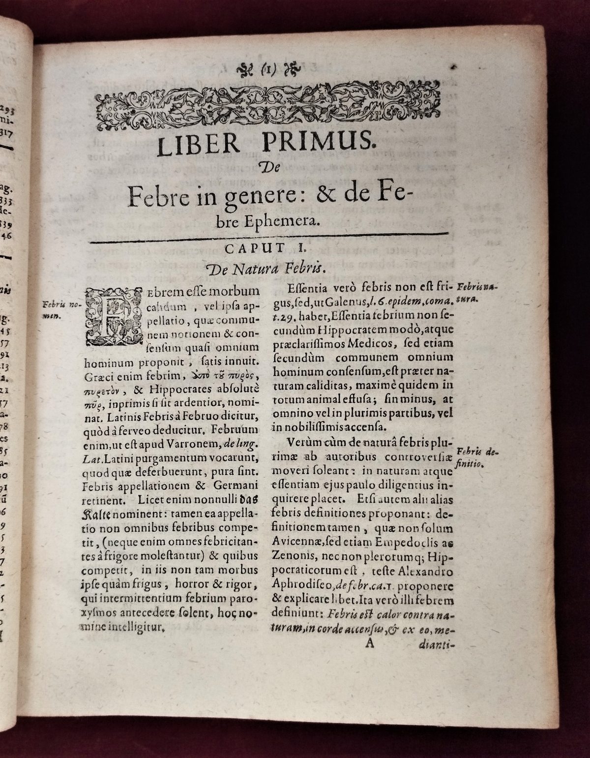 Page 1 in a 17th-century printed book, with a floral woodcut headpiece above a Latin text in two columns beginning with a decorative woodcut letter F.