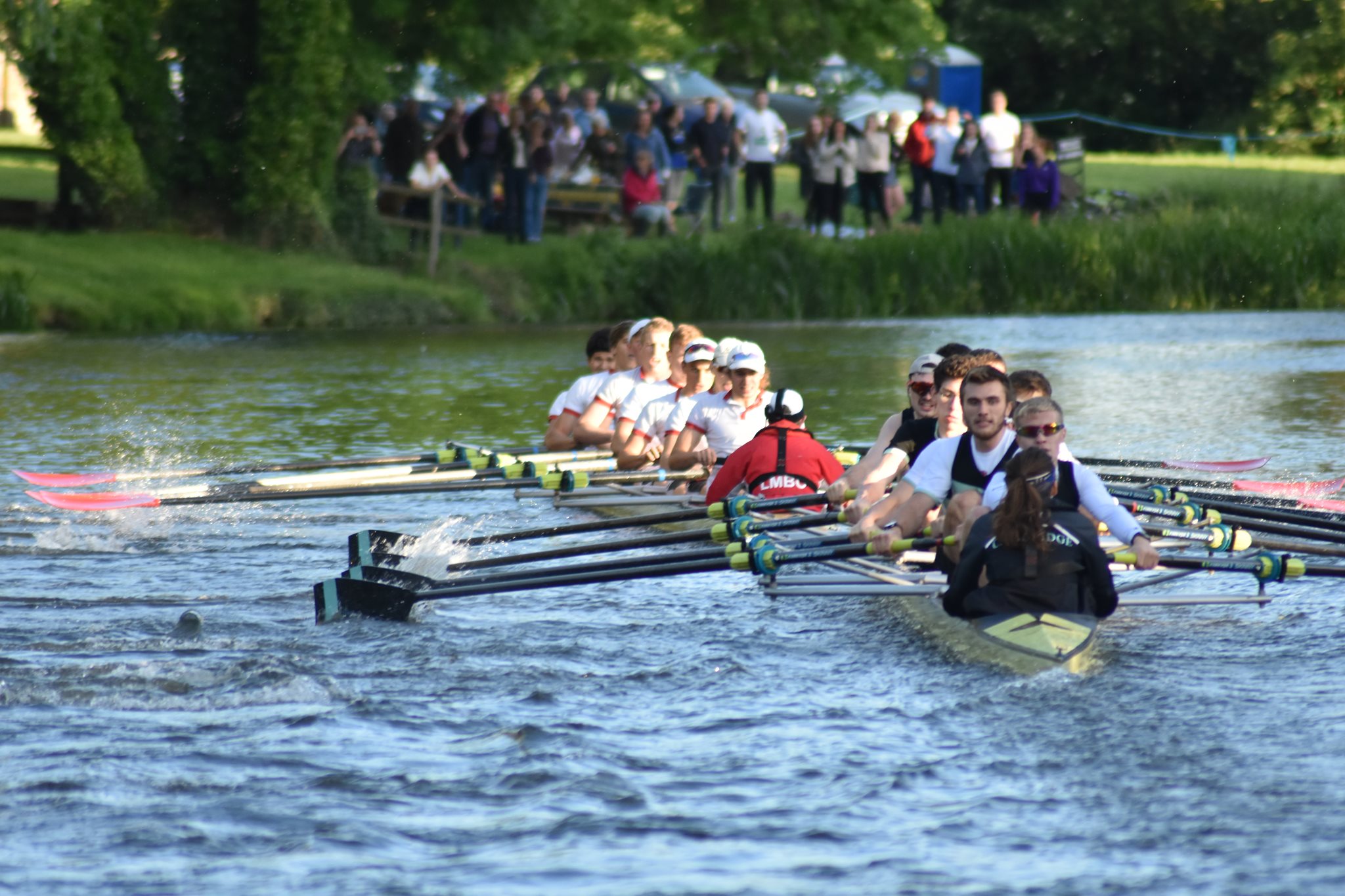 Two boats competing in May Bumps 2019 on the River Cam