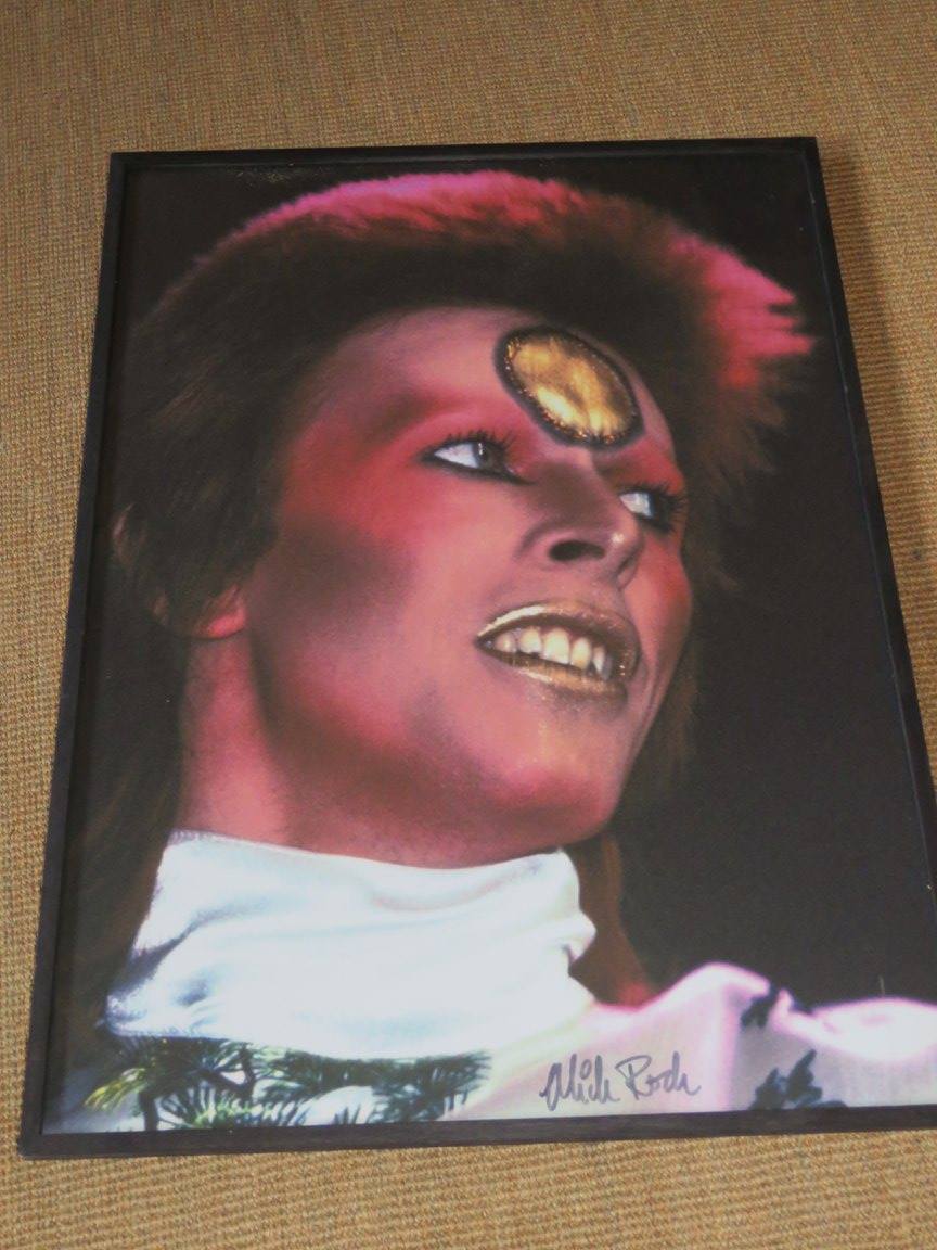 A portrait of David Bowie as Ziggy Stardust
