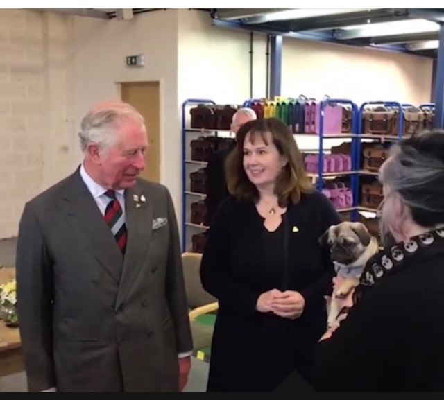 HRH The Prince of Wales pictured with Julie Deane on a factory tour