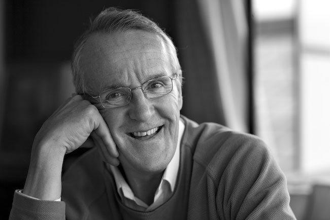 Black and white portrait photo of Simon Maddrell