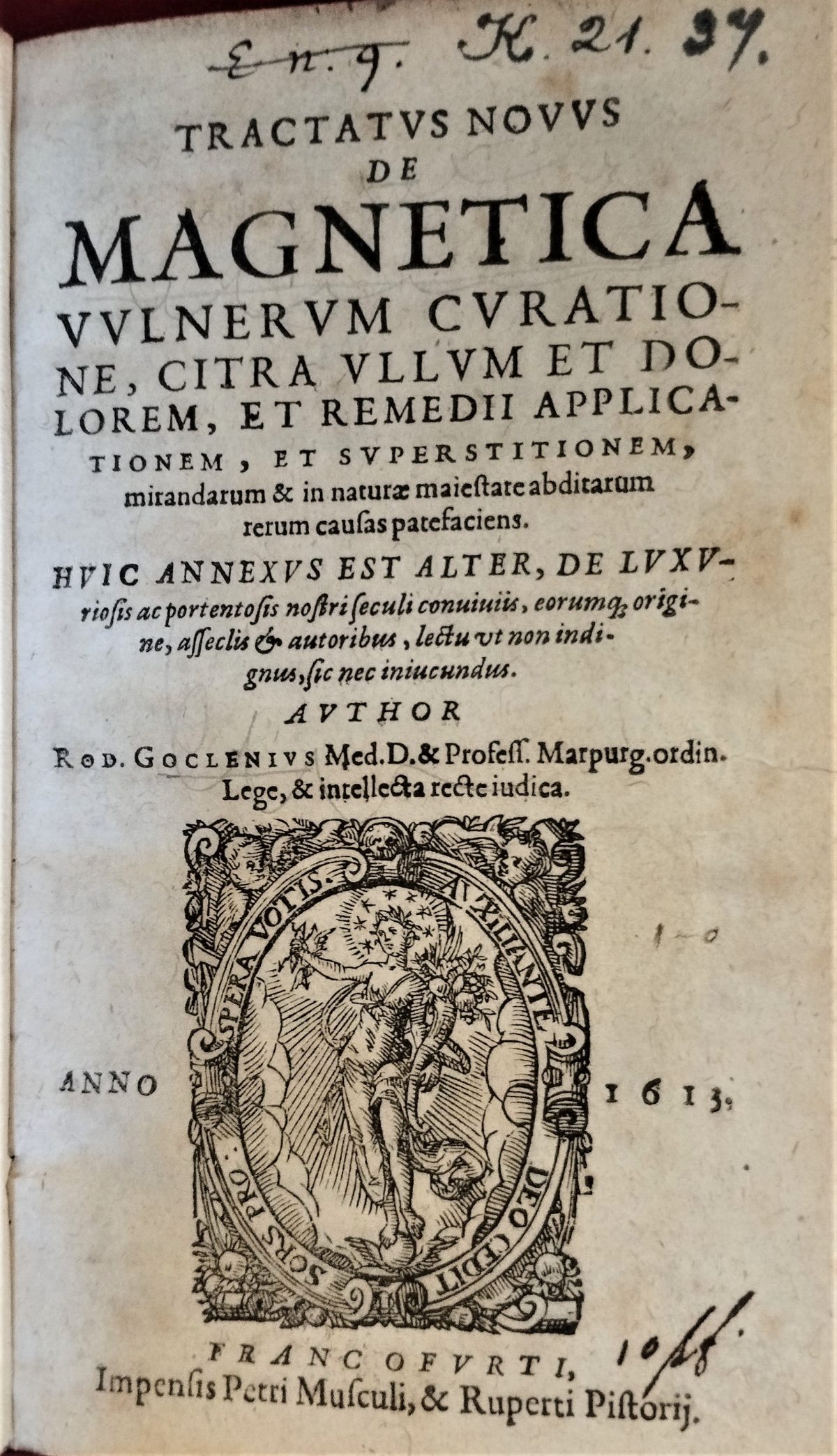 The title page in a 17th-century printed book, with a long Latin text in varied typography and a woodcut illustration serving as the printer's device.